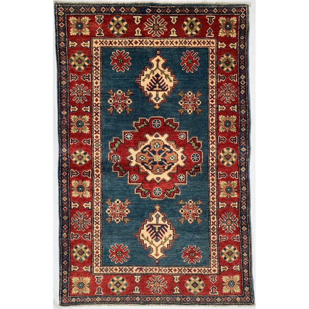 Tappeto geometrico blu Kazak misura 96x153 cm