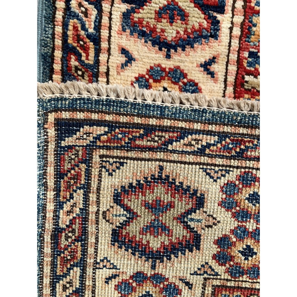 Tappeto geometrico azzurro Kazak misura 103x140 cm