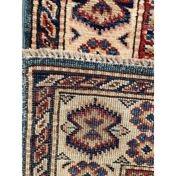 Tappeto geometrico azzurro Kazak misura 103x140 cm